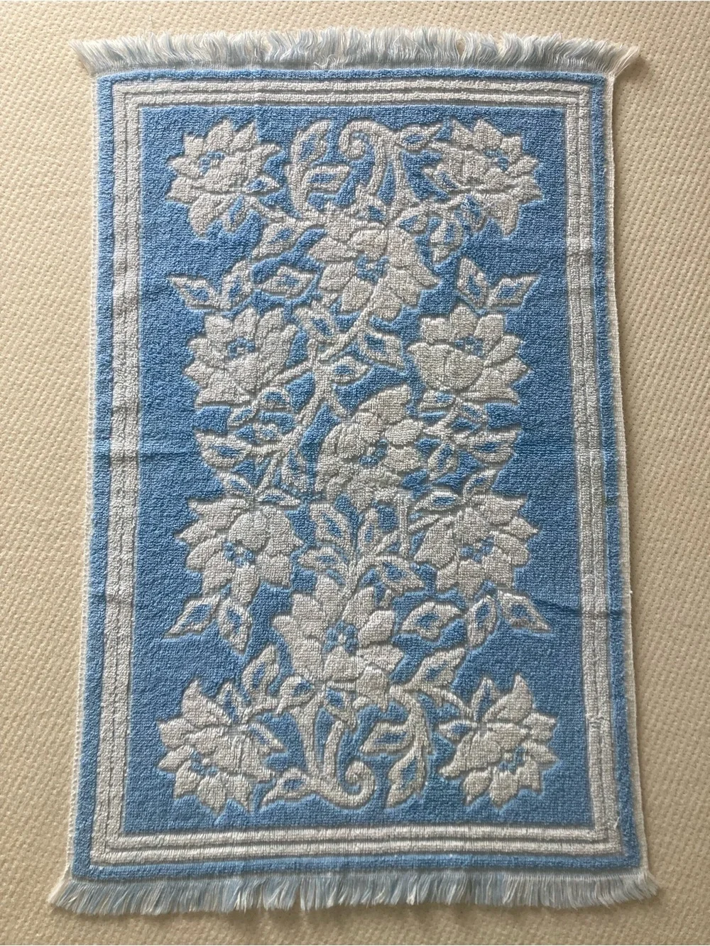 Blue and white vintage Fieldcrest towel with fringe
